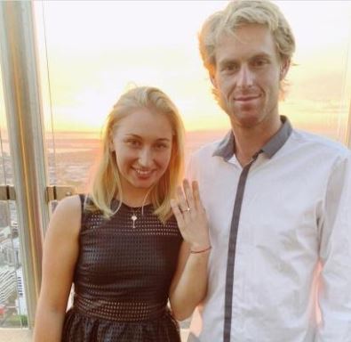 Luke Saville with his fiance Daria Gavrilova flaunting her engagement ring